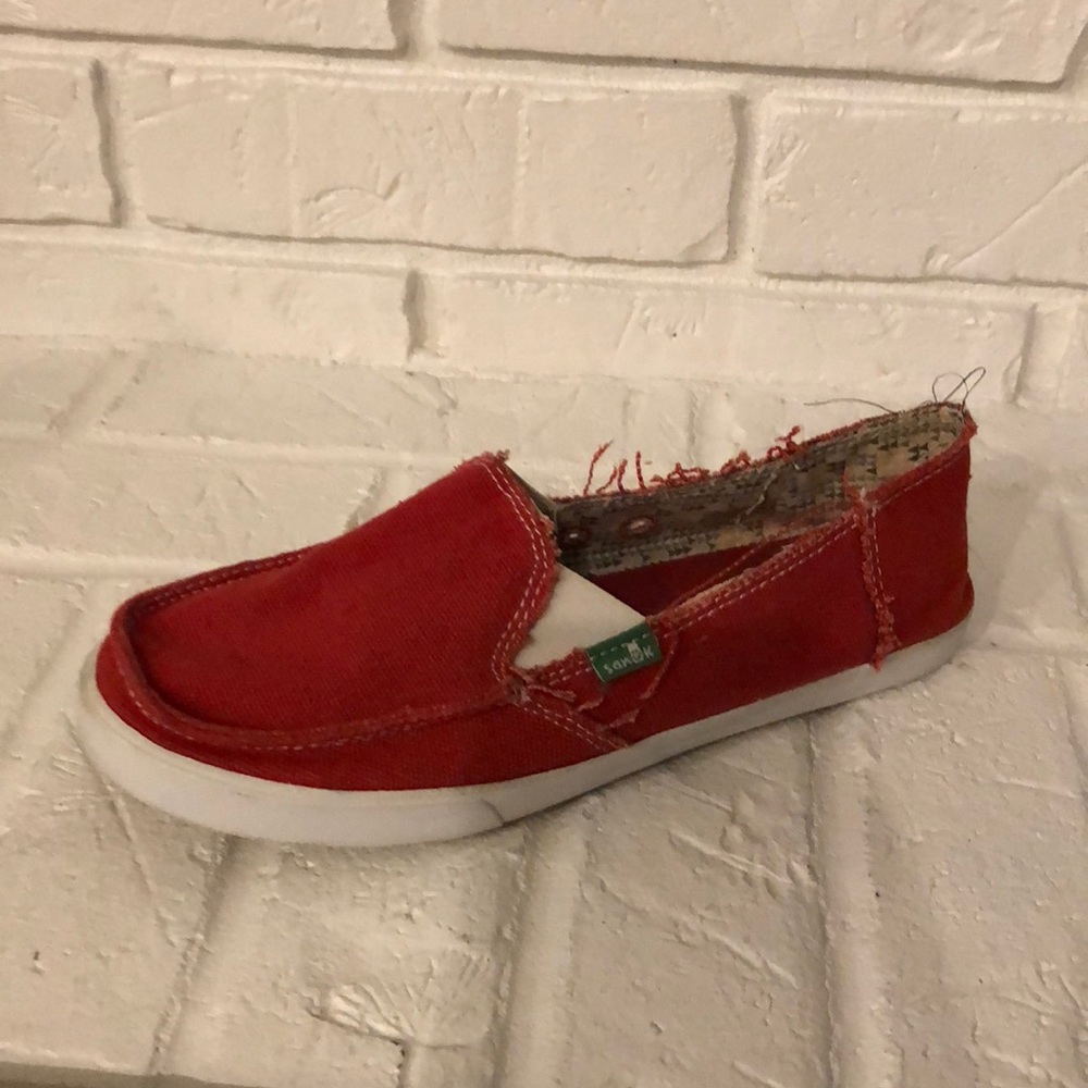 Red Sanuk slip ons